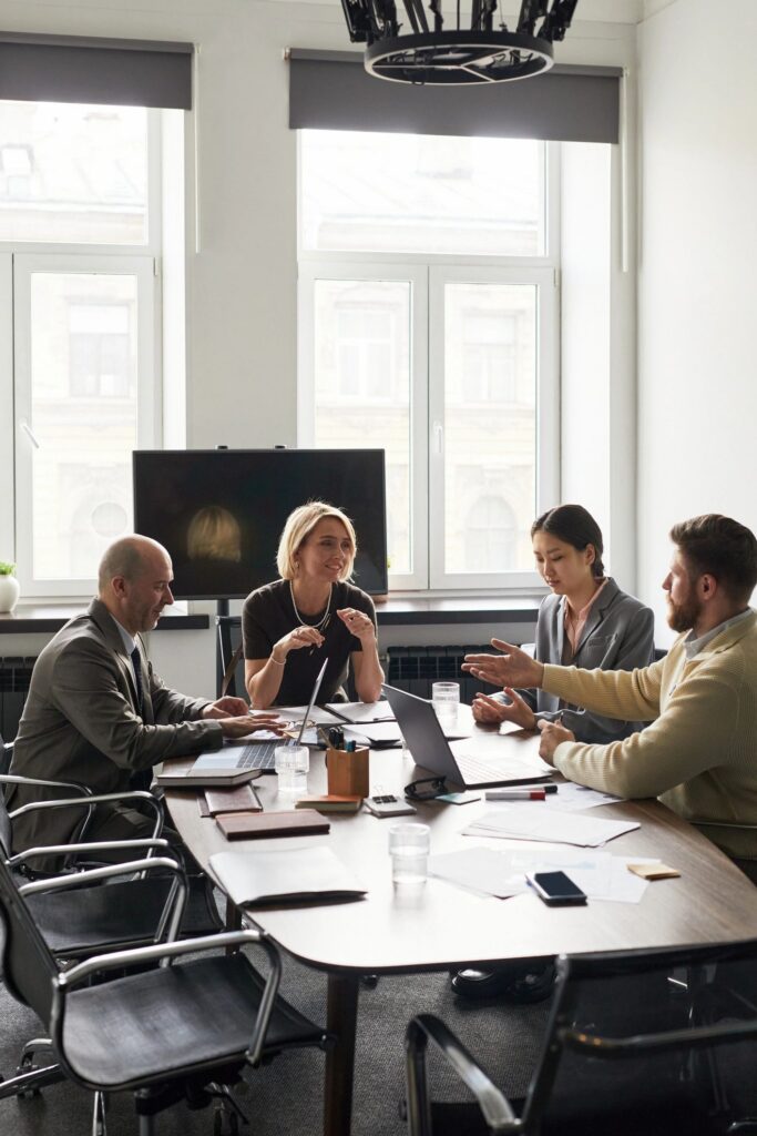 Business Team Discussing Strategy during Office Meeting